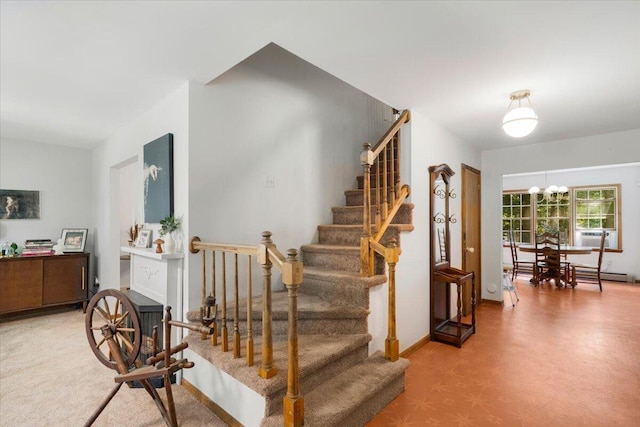 114 Gregory Ct, Stroudsburg, PA 18360 - staircase featuring a chandelier, cooling unit, and a baseboard heating unit