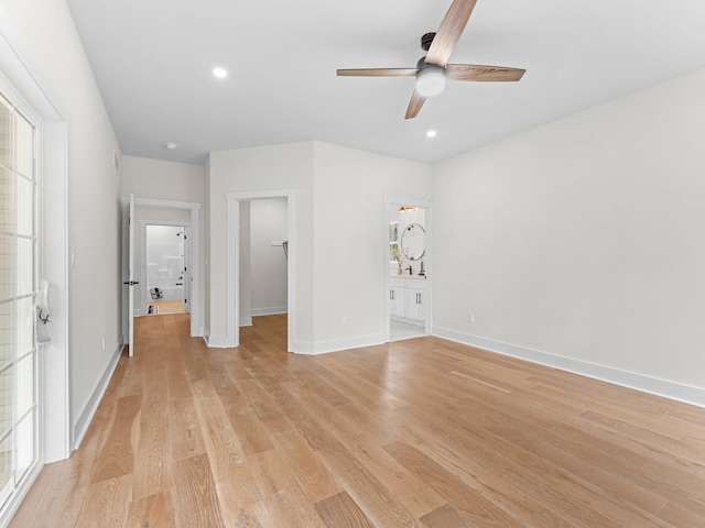 26 Susquehanna Dr, Jim Thorpe, PA 18229 - unfurnished bedroom featuring a walk in closet, light wood-type flooring, ensuite bath, recessed lighting, and a ceiling fan