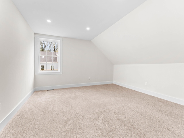 26 Susquehanna Dr, Jim Thorpe, PA 18229 - additional living space with light carpet, lofted ceiling, and recessed lighting