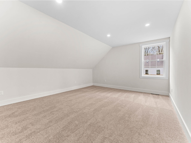 26 Susquehanna Dr, Jim Thorpe, PA 18229 - additional living space featuring vaulted ceiling, recessed lighting, and light colored carpet