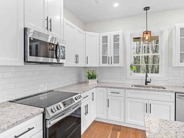 26 Susquehanna Dr, Jim Thorpe, PA 18229 - kitchen featuring stainless steel appliances, glass insert cabinets, and white cabinets
