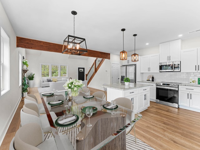 26 Susquehanna Dr, Jim Thorpe, PA 18229 - dining room with stairs, light wood-style floors, recessed lighting, and a chandelier