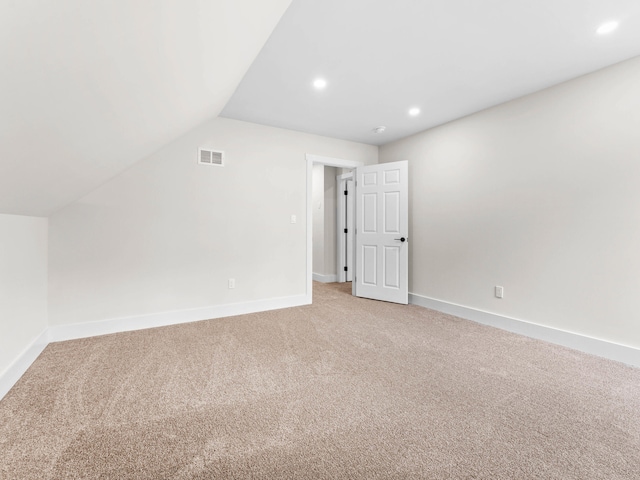 26 Susquehanna Dr, Jim Thorpe, PA 18229 - additional living space featuring light carpet, recessed lighting, and lofted ceiling
