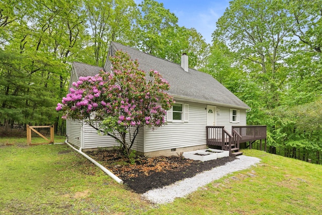 1221 Alder Rd, East Stroudsburg, PA 18302 - rear view of house with a chimney, roof with shingles, and a deck