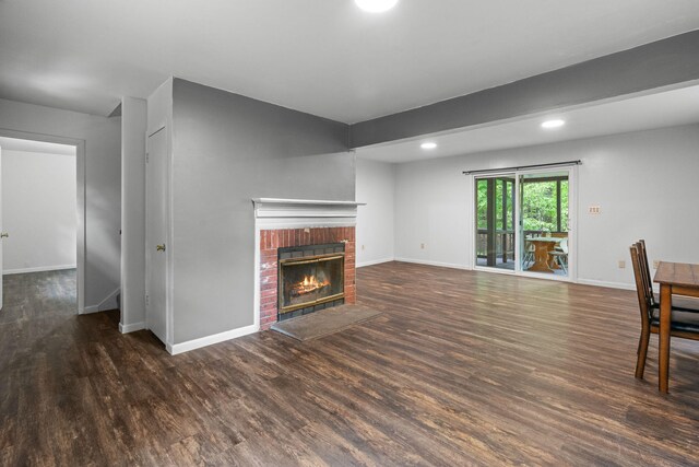 1221 Alder Rd, East Stroudsburg, PA 18302 - unfurnished living room featuring wood finished floors, baseboards, a fireplace, and recessed lighting