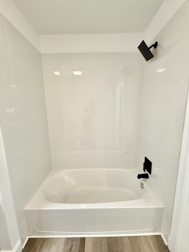 459 Pocono Blvd, Bushkill, PA 18324 - bathroom featuring wood finished floors and shower / tub combination