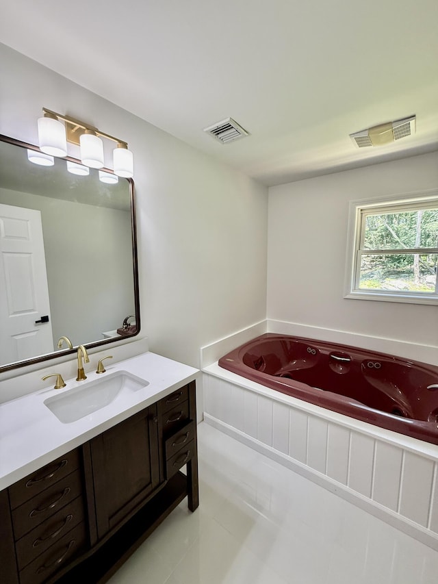 459 Pocono Blvd, Bushkill, PA 18324 - bathroom with vanity, tile patterned floors, and a whirlpool tub