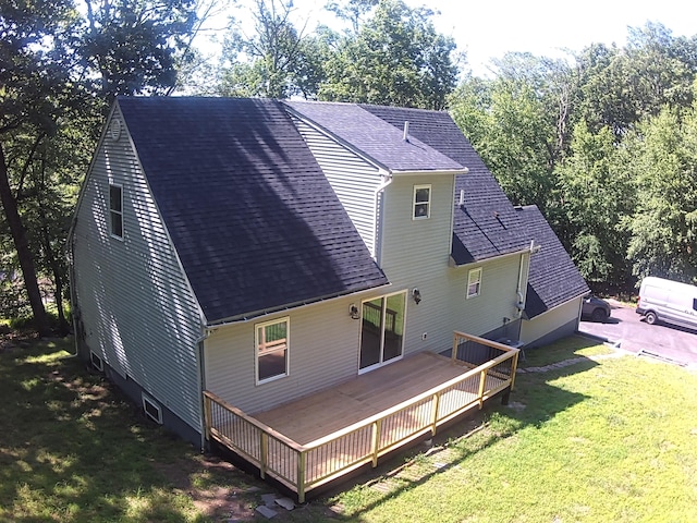 459 Pocono Blvd, Bushkill, PA 18324 - back of house with roof with shingles, a lawn, a wooden deck, and view of scattered trees