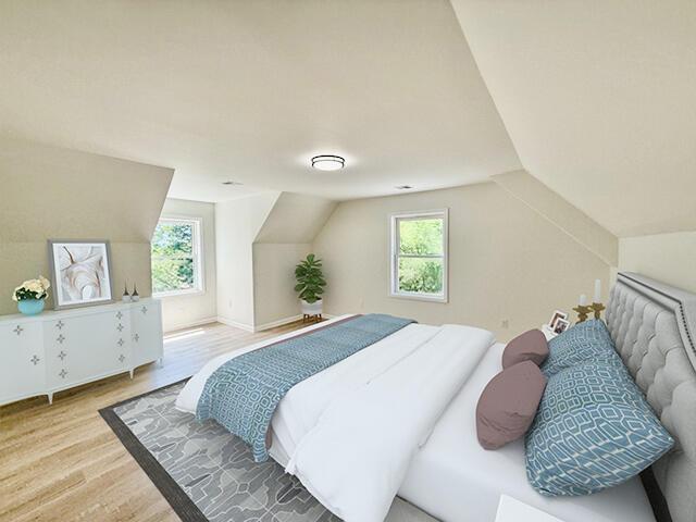 459 Pocono Blvd, Bushkill, PA 18324 - bedroom featuring wood finished floors and vaulted ceiling