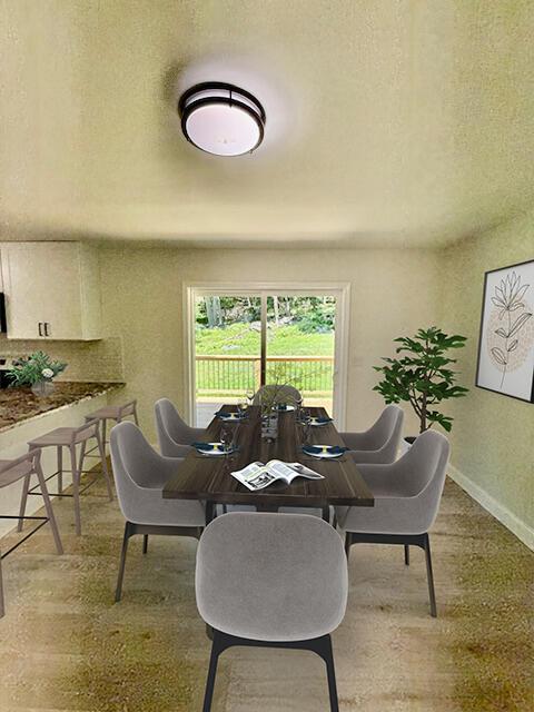 459 Pocono Blvd, Bushkill, PA 18324 - dining area featuring light wood-style floors and a textured ceiling