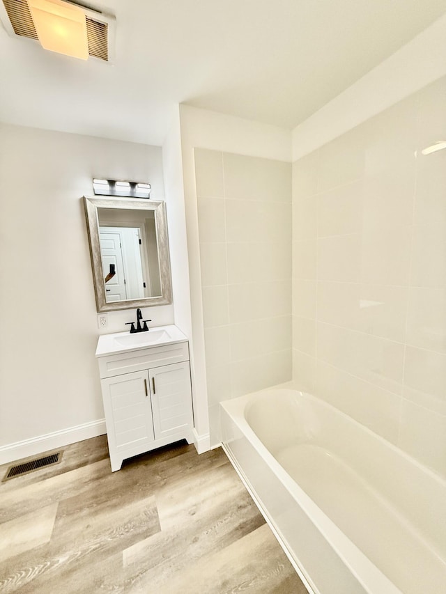 459 Pocono Blvd, Bushkill, PA 18324 - bathroom with wood finished floors, vanity, and shower / bath combination
