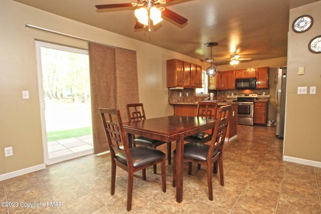 158 Davis Cir, Bushkill, PA 18324 - tiled dining area with a ceiling fan and healthy amount of natural light