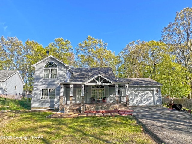 158 Davis Cir, Bushkill, PA 18324 - view of front of property featuring covered porch, a garage, and driveway