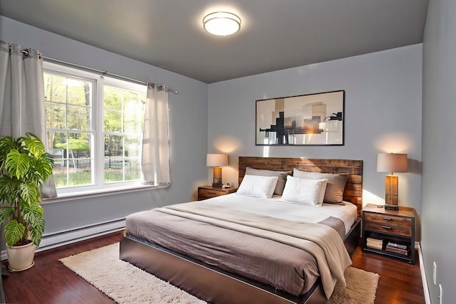 158 Davis Cir, Bushkill, PA 18324 - bedroom featuring baseboard heating and wood finished floors