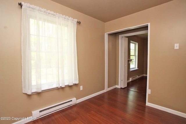 158 Davis Cir, Bushkill, PA 18324 - spare room with a baseboard radiator and wood finished floors