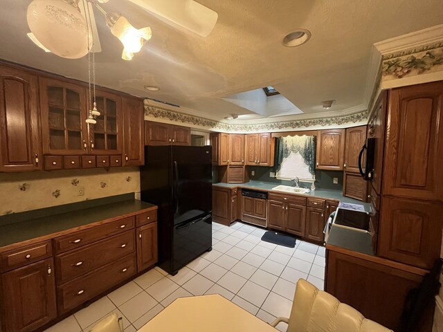 122 Savage Trl, East Stroudsburg, PA 18301 - kitchen with black appliances, light tile patterned floors, glass insert cabinets, dark countertops, and ornamental molding