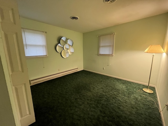 122 Savage Trl, East Stroudsburg, PA 18301 - empty room with a baseboard radiator and dark carpet