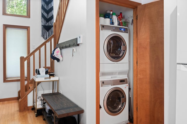 130 Ruffed Grouse Rd, Bushkill, PA 18324 - washroom featuring stacked washer / drying machine and hardwood / wood-style floors
