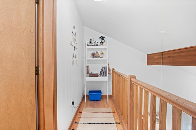 130 Ruffed Grouse Rd, Bushkill, PA 18324 - staircase featuring wood finished floors and vaulted ceiling