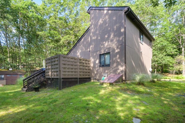 130 Ruffed Grouse Rd, Bushkill, PA 18324 - view of side of home with a yard and stairs