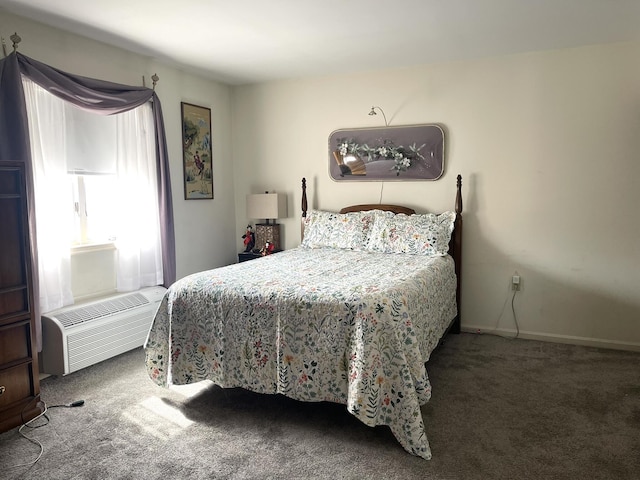 carpeted bedroom with an AC wall unit