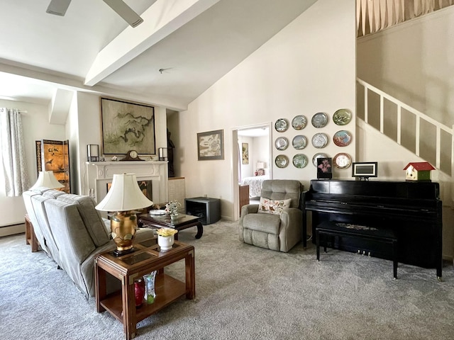 living area featuring beamed ceiling, high vaulted ceiling, stairway, carpet floors, and a fireplace