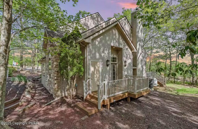 view of front of home with a deck