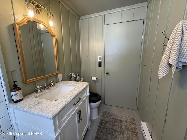 1827 Stag Run, Pocono Lake, PA 18347 - bathroom featuring vanity, toilet, and wood finished floors