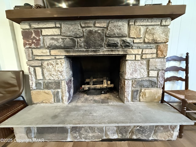 1827 Stag Run, Pocono Lake, PA 18347 - room details with a stone fireplace and wood finished floors