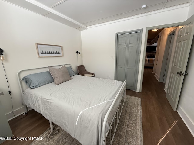 1827 Stag Run, Pocono Lake, PA 18347 - bedroom with a closet, baseboards, and wood finished floors