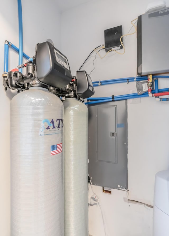 utility room featuring electric panel