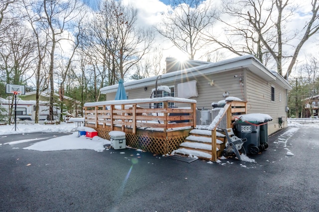 view of front of home with a wooden deck