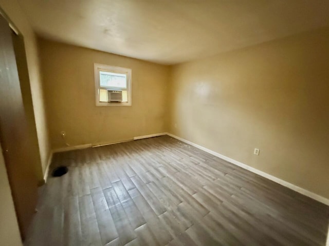 190 Carverton Rd, Trucksville, PA 18708 - empty room featuring baseboards, dark wood-style flooring, and cooling unit