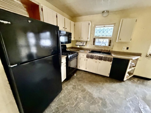 190 Carverton Rd, Trucksville, PA 18708 - kitchen with a sink, white cabinets, and black appliances