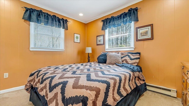 carpeted bedroom with baseboards, a baseboard radiator, and multiple windows