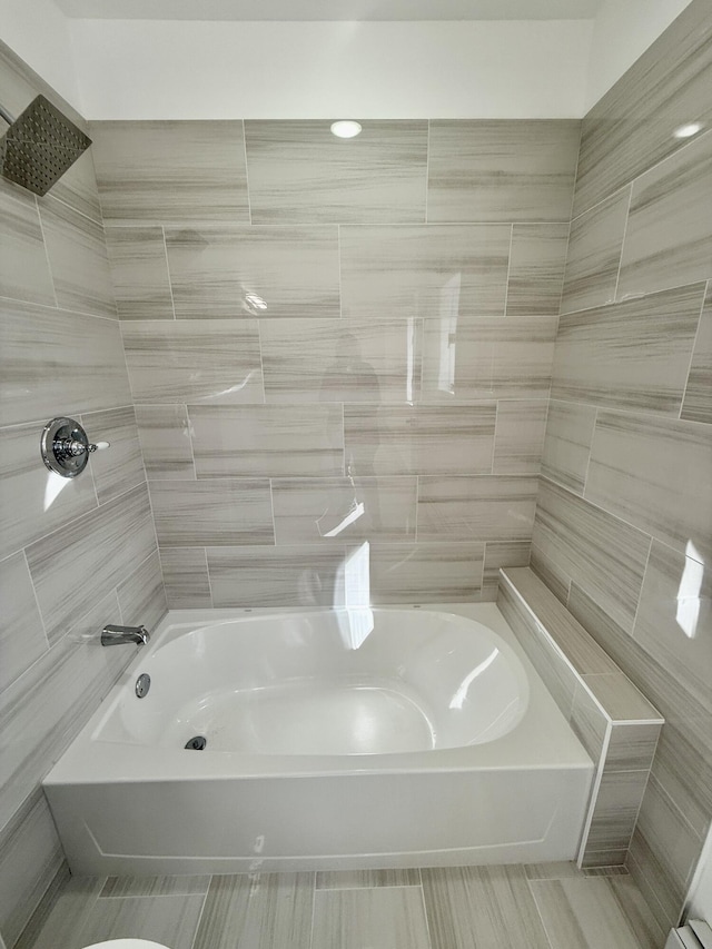 full bath featuring shower / bathing tub combination