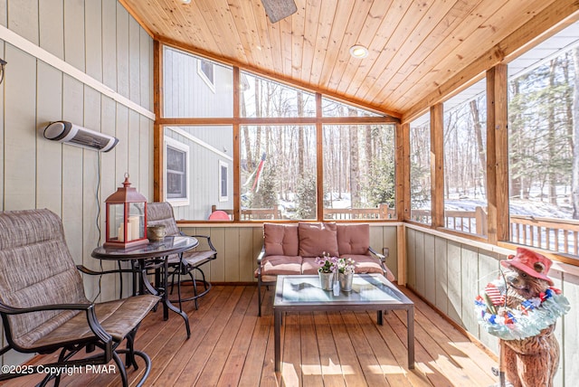 sunroom / solarium featuring wood ceiling and lofted ceiling