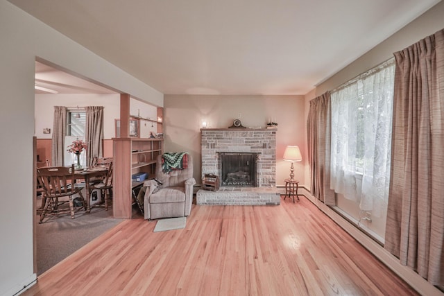 60 Maple Dr, Palmerton, PA 18071 - living room featuring wood finished floors and a fireplace with raised hearth