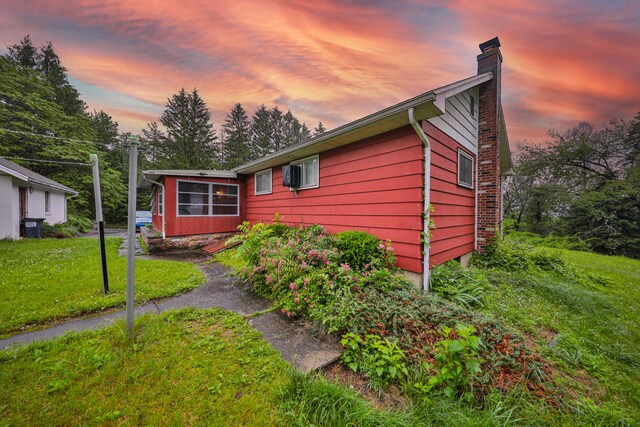 60 Maple Dr, Palmerton, PA 18071 - view of property exterior with a chimney and a lawn