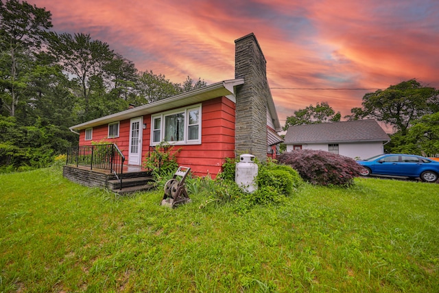 60 Maple Dr, Palmerton, PA 18071 - view of front of property featuring a chimney and a yard