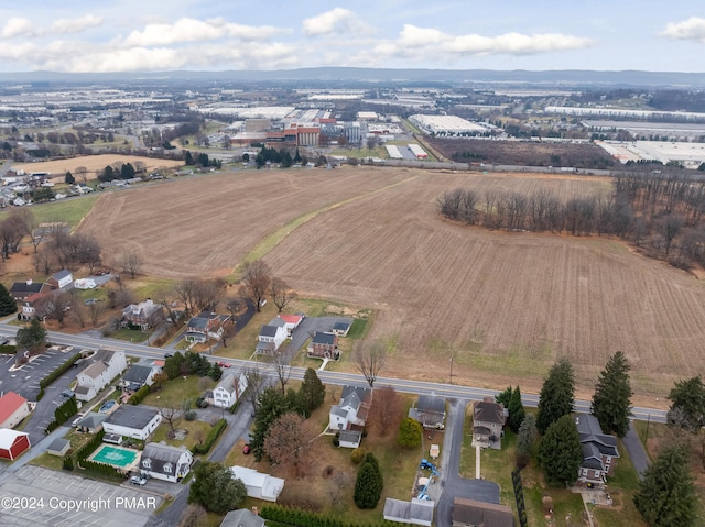 birds eye view of property featuring a rural view