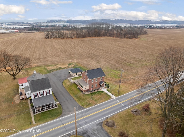 birds eye view of property featuring a rural view