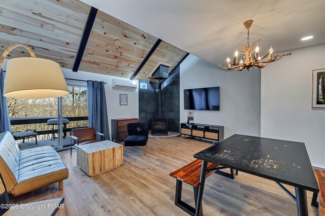 living room with lofted ceiling with beams, an AC wall unit, a wood stove, wooden ceiling, and hardwood / wood-style flooring