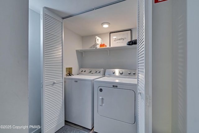 laundry room featuring separate washer and dryer