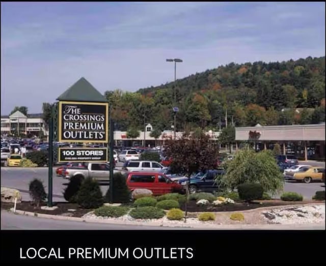 exterior space featuring uncovered parking