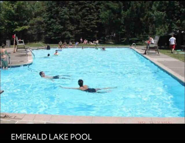pool with a patio area