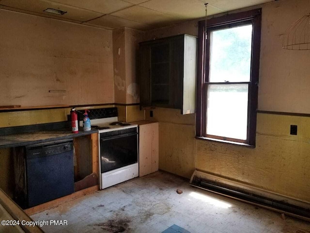 kitchen with dark countertops, white electric range oven, black dishwasher, and light floors