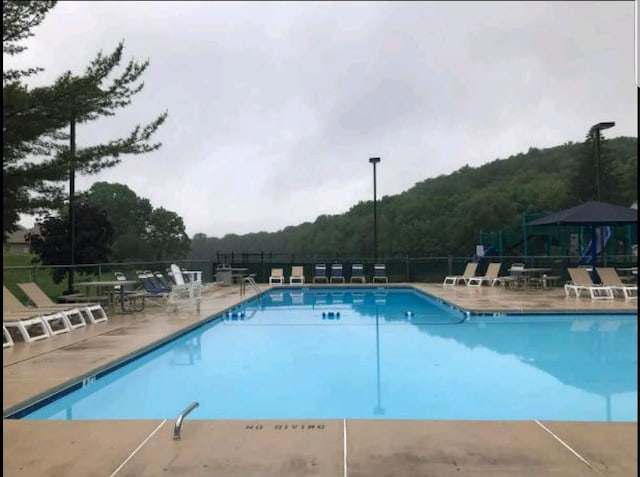 3221 Windermere Dr, Bushkill, PA 18324 - community pool with a patio area