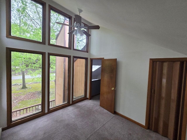 3221 Windermere Dr, Bushkill, PA 18324 - carpeted spare room with a ceiling fan and high vaulted ceiling