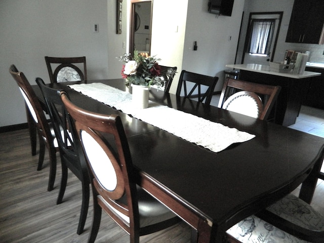 7086 Boulder Ct, Tobyhanna, PA 18466 - dining area featuring wood finished floors and baseboards